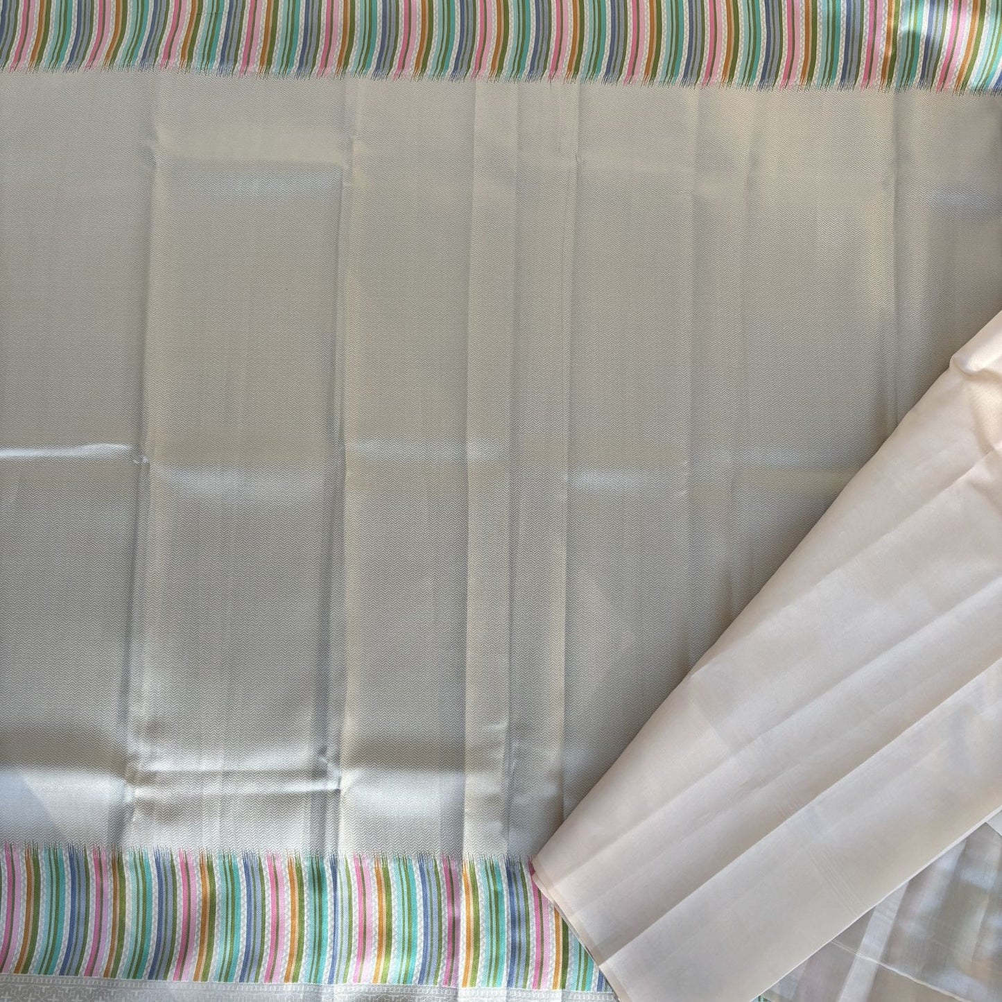 Ivory with Rainbow border Kanjeevaram Silk Saree