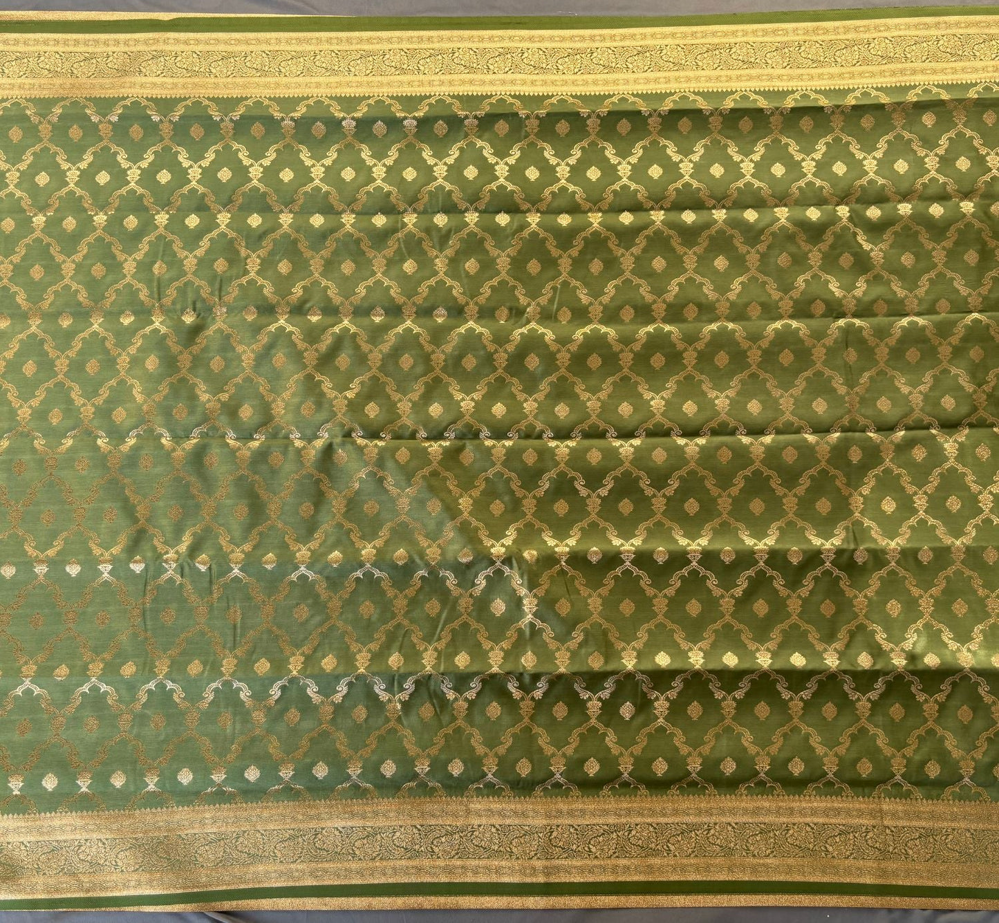 Green Rich Sheen Checks Floral jal Silk Saree