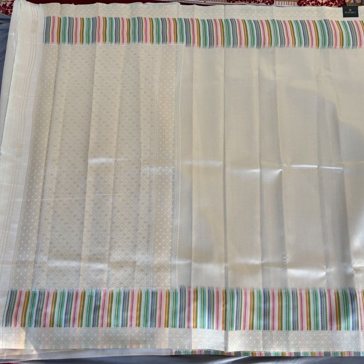 Ivory with Rainbow border  Kanjeevaram Silk Saree