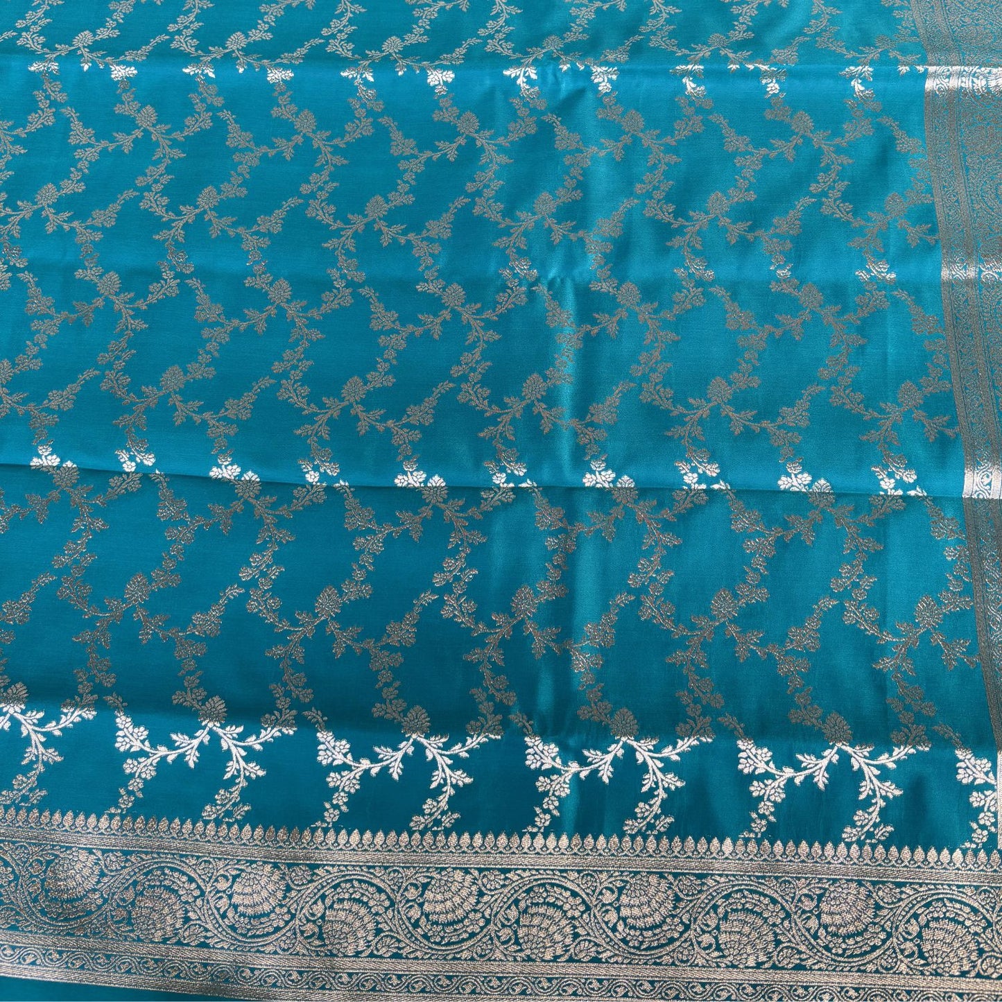 Sky Blue Rich Shine Floral Jal Silk Saree
