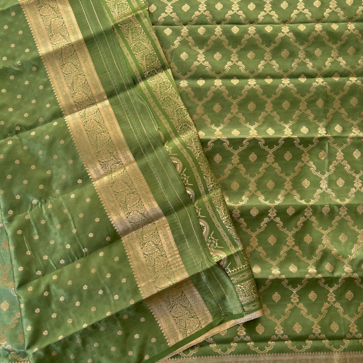 Green Rich Sheen Checks Floral jal Silk Saree